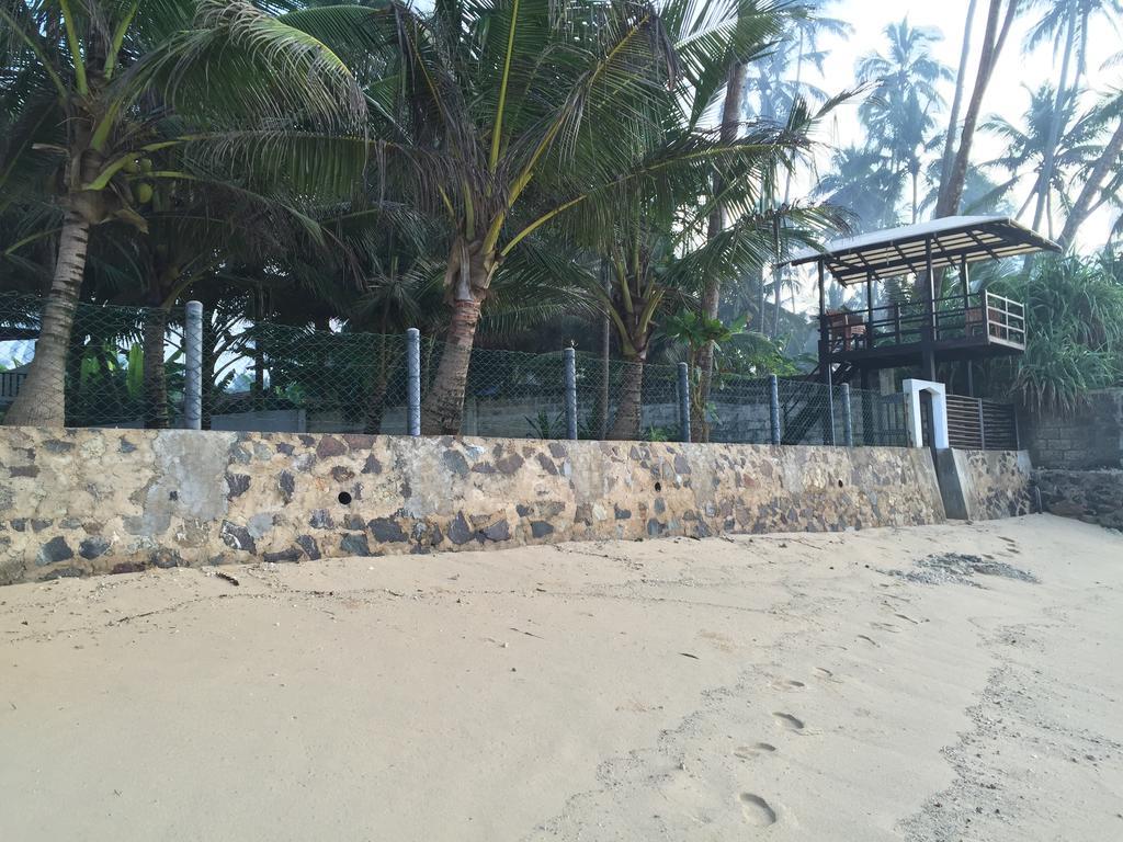 Seachange Talpe Exterior photo